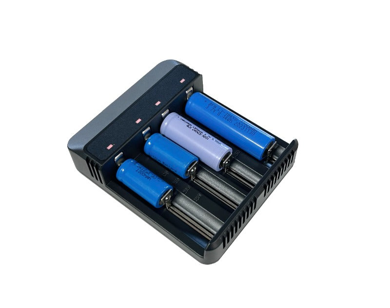 Four-slot charger holding rechargeable batteries