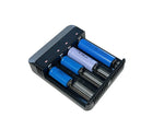 Four-slot charger holding rechargeable batteries